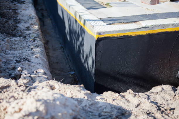 Professional Foundation Crack Repair technician working in Hart, MI